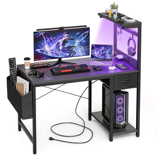 Gaming Desk with Power Outlet LED Light Reversible Shelves Storage Drawer