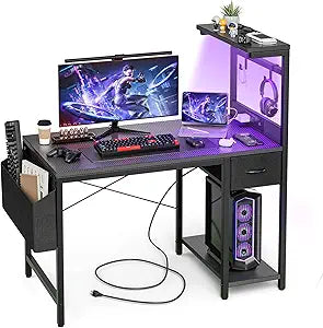 Gaming Desk with Power Outlet LED Light Reversible Shelves Storage Drawer