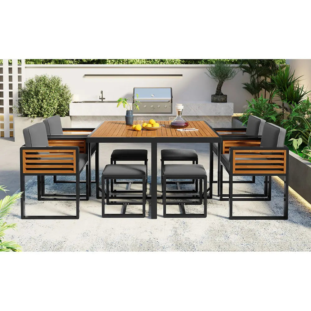 9-Piece Acacia Wood Patio Dining Set with Cushioned Chairs and Ottomans